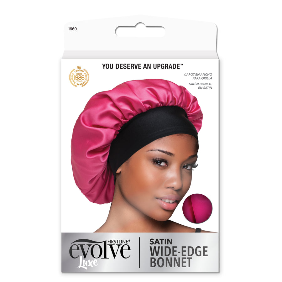 model wearing Evolve's pink satin wide-edge bonnet on front of product package