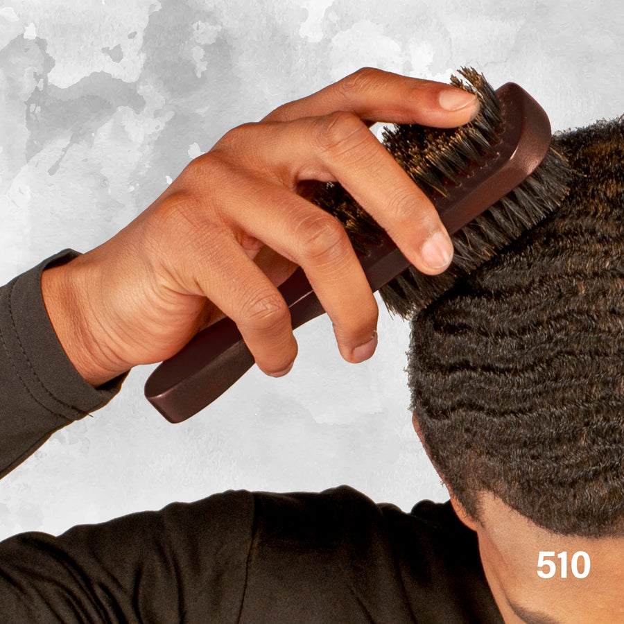 man brushing hair with WavEnforcer Double-Sided Fade Brush